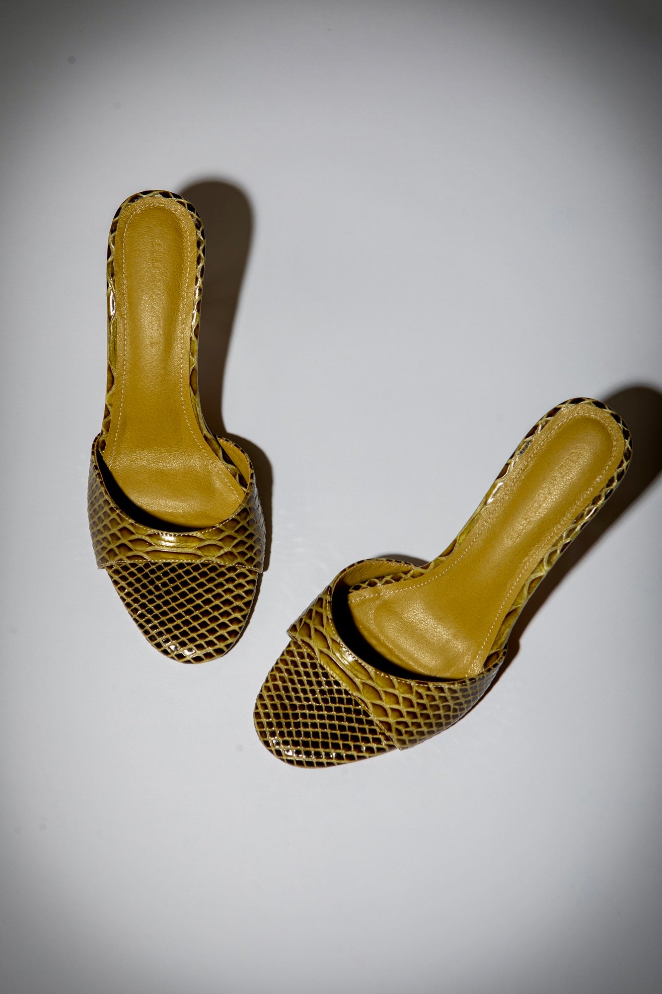 Nour Olive Snake Mules